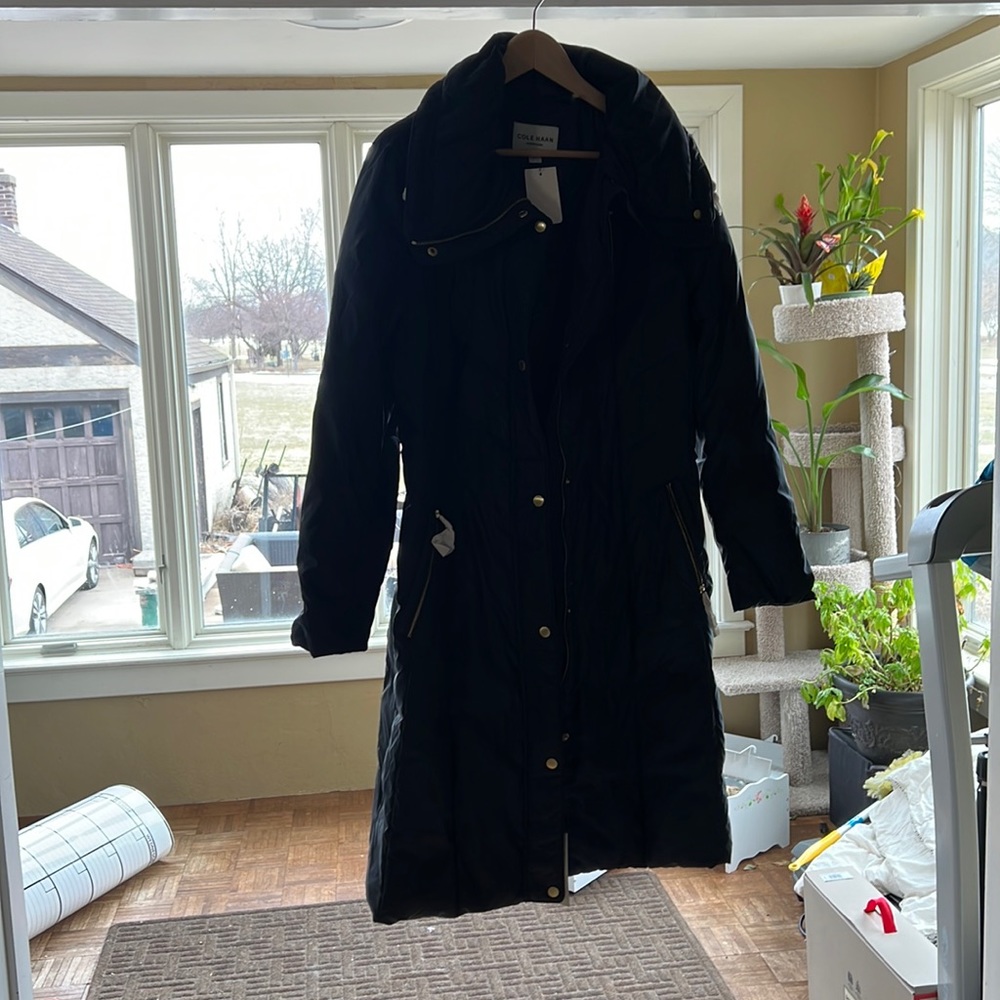Long navy Cole Haan puffer coat.